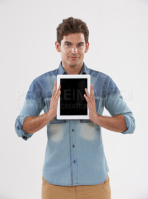 Buy stock photo Portrait, screen or man holding a tablet, communication or connection on white studio background. Face, person or model with tech, internet or social media with presentation or email with digital app