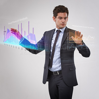 Buy stock photo Shot of a thoughtful-looking businessman using a digital interface
