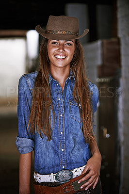 Buy stock photo Woman or cowgirl, happy and portrait in stable for work or rodeo in Texas, western and culture for farming. Female cowboy or jockey, ranch and hat for barn agriculture and countryside with equestrian