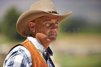 Buy stock photo Cowboy, ranch and thinking in outdoor, sun and serious for wrangler and Texas farmer at stable. Mature man, wild west and summer in agriculture, hat and person with shirt in farm job and environment