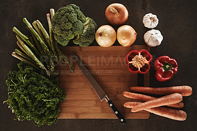 Buy stock photo Vegetables on a chopping board