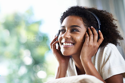 Buy stock photo Woman, smile and headphone on head for podcast, music and audio indoor with bokeh background and mockup. Young person or student with technology or gadget for carefree and weekend with radio and song