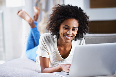 Buy stock photo Smile, relax and woman with a laptop, typing and connection for movies, social media and online reading. Female person, happy lady and girl with happiness, technology and chatting at home