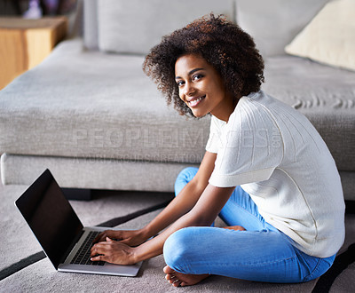 Buy stock photo Smile, laptop and portrait of woman on floor working on freelance creative project in living room. Happy, technology and African female designer typing on computer for research on rug in apartment.