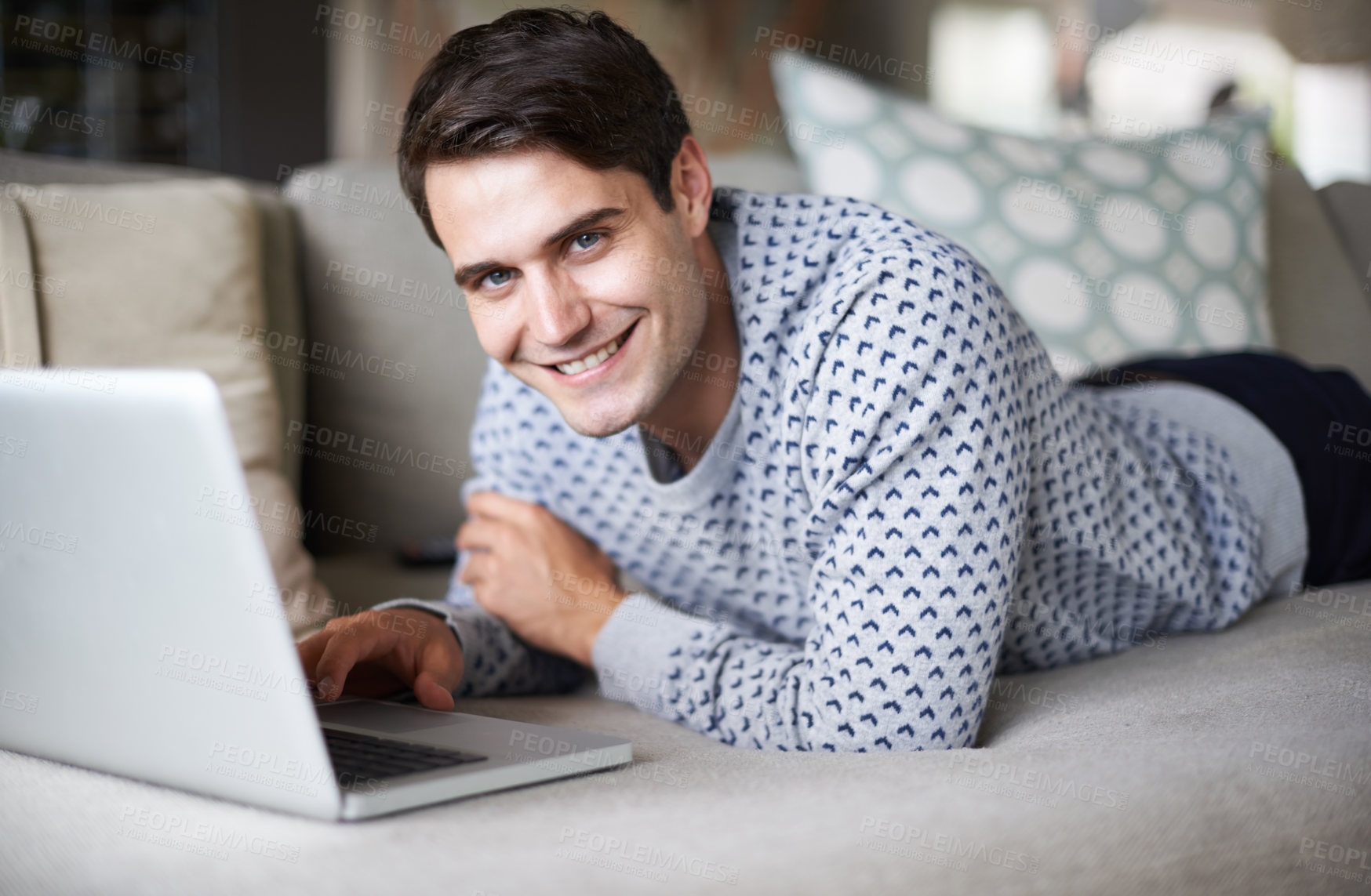 Buy stock photo Man, home and smile in sofa with laptop to browse internet for streaming service and entertainment. Male person, living room and happy on couch with website for online information and news update