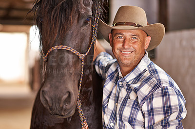 Buy stock photo Cowboy, man and horse in stable with smile in portrait for care, growth or development at farm, ranch or countryside. Person, animal or equine pet with love, happy or connection for wellness in Texas
