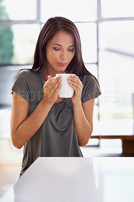 Buy stock photo Woman, coffee and mug with kitchen, blow and morning for home routine. Person, cup and tea with house, beverage and aroma for relax and caffeine or taste and drinking to enjoy break with happiness
