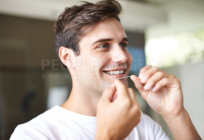 Buy stock photo Closeup of a young man flossing