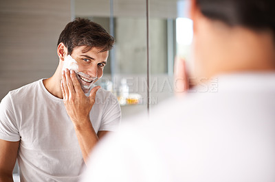 Buy stock photo Mirror, shaving and portrait of man in bathroom for facial grooming, wellness and beauty at home. Health, skincare and happy male person with shave foam for face hygiene, cleaning and hair removal