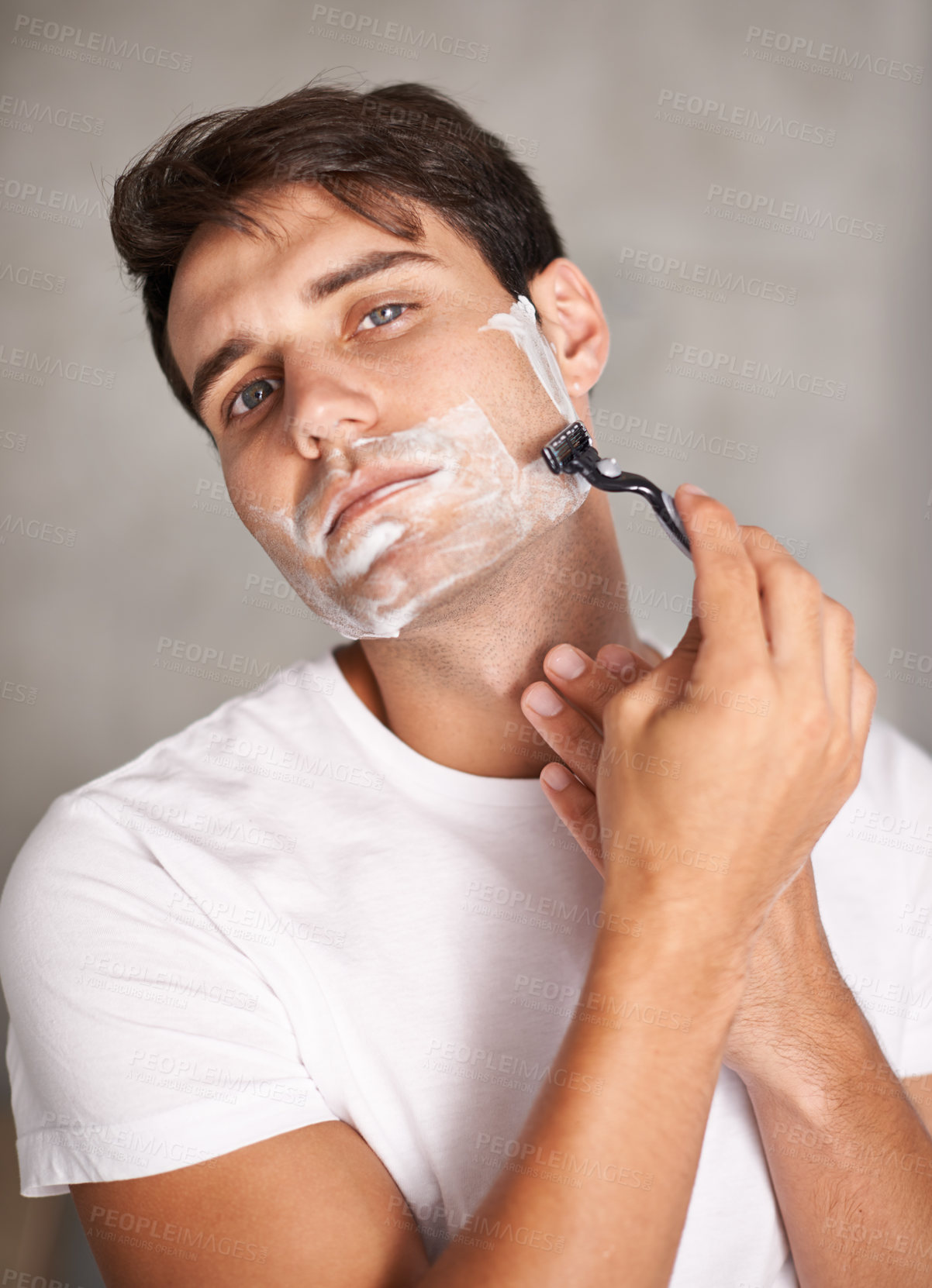 Buy stock photo Cleaning, shaving and portrait of man in bathroom for facial grooming, wellness and cosmetics at home. Health, skincare and male person shave for face hygiene, self care and hair removal with razor