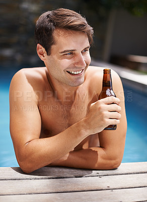 Buy stock photo Man, relax and smile in swimming pool with beer to drink or chill on summer vacation, luxury and resort or villa. Male person, bottle and alcohol for refreshments on tropical holiday in Maldives.