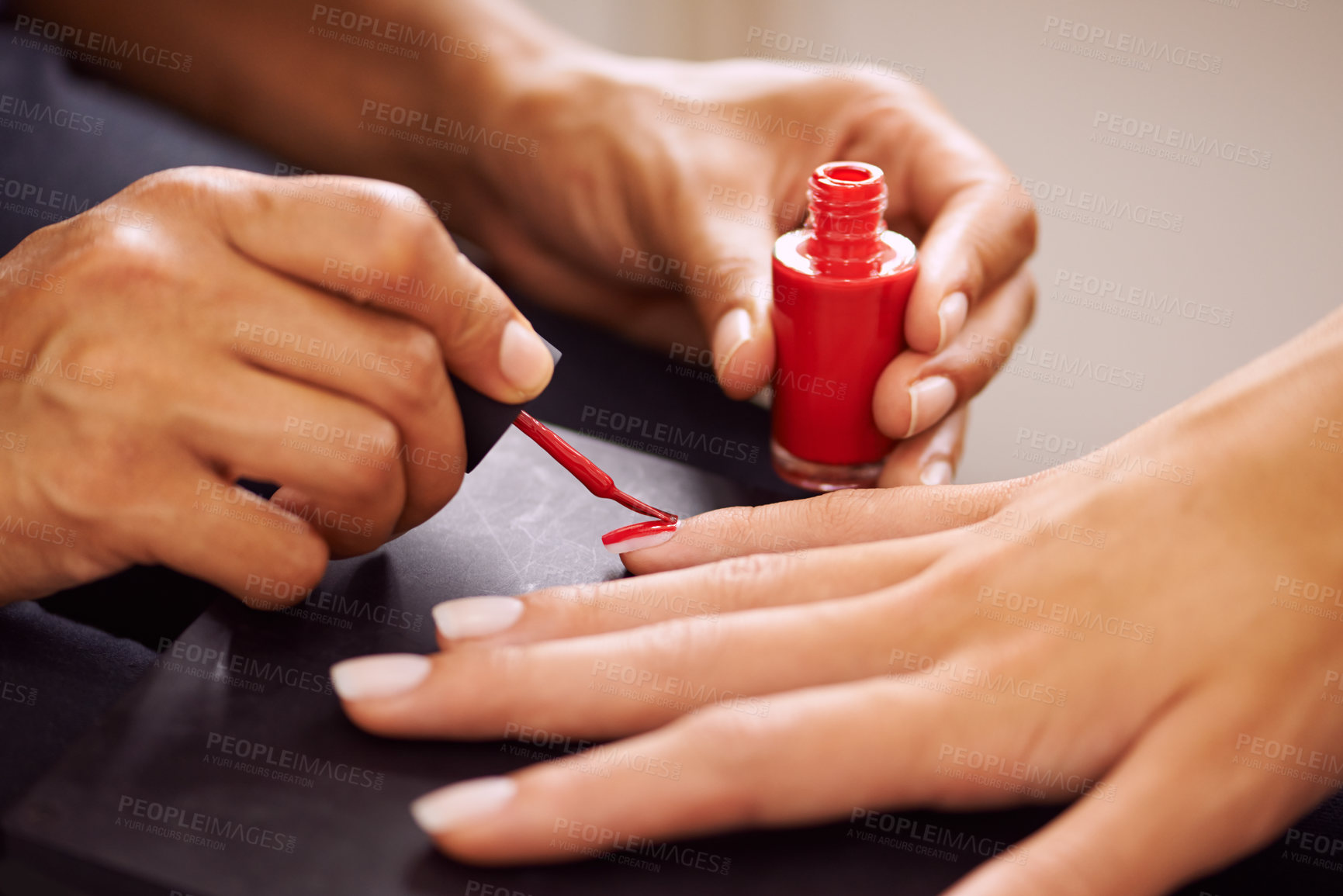 Buy stock photo Nail polish, manicure and hands of woman with red color for salon treatment, cosmetics and pamper. Luxury spa, beautician and person painting nails for grooming service, beauty aesthetic and wellness