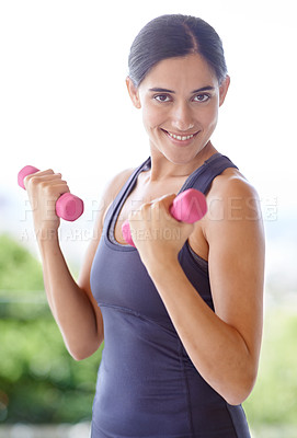 Buy stock photo Woman, portrait and dumbbell with lifting weights for fitness outdoor with smile, wellness or healthy body. Athlete, person and face with training equipment for exercise, workout or physical activity