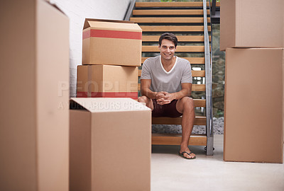 Buy stock photo Man, moving and portrait in new house by stairs with boxes, fresh start or investment in real estate. Person, cardboard and package on steps in apartment, home or happy for rent, mortgage or property
