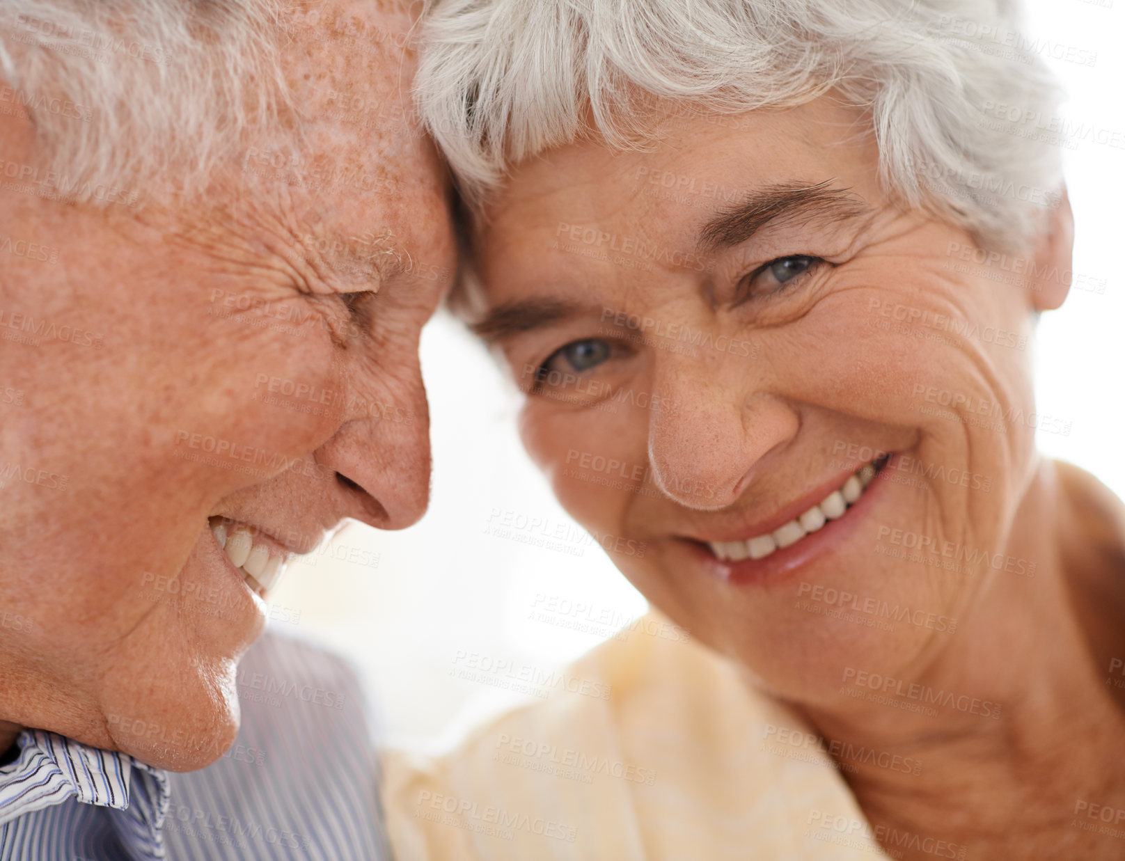 Buy stock photo Couple, senior and forehead touch in portrait, home and relax together for bonding and smile. Elderly people, love and care in marriage or relationship in retirement, closeup and security in house