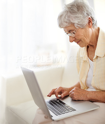 Buy stock photo Senior woman, laptop and home planning for reading, typing or search an ebook on internet. Happy elderly person with computer for learning, website and online crossword game for sign up information