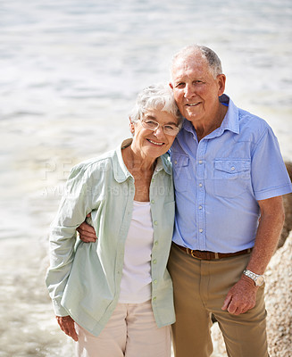 Buy stock photo Senior, couple and happy portrait at beach for retirement vacation or anniversary to relax with love, care and commitment with support. Elderly man, woman and together by ocean for peace on holiday.