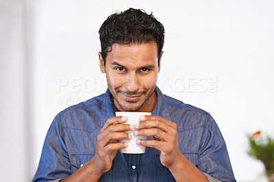 Buy stock photo Calm, man and drink on coffee break in home, morning with peace and happiness with Mexican espresso. Person, smile and relax with latte, matcha or tea in white background of house with mock up space