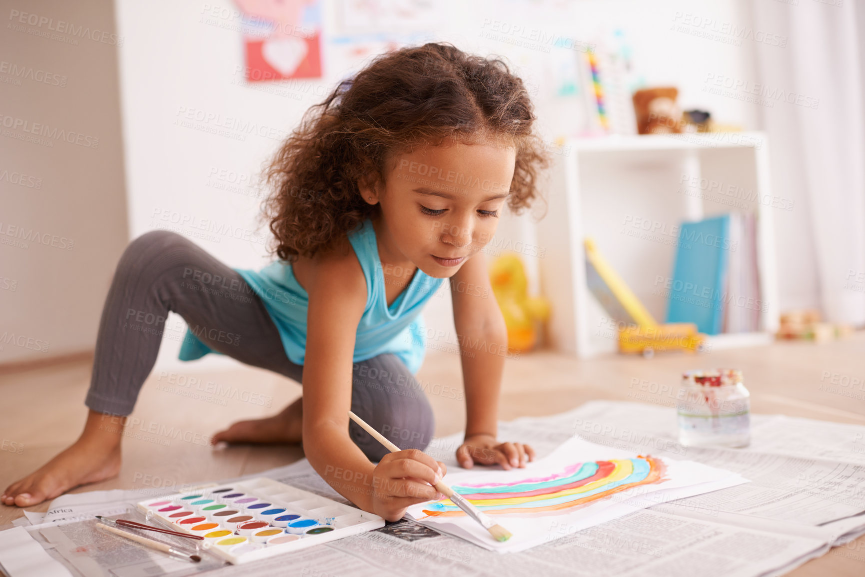 Buy stock photo School, education or girl painting a rainbow on classroom floor for creative, learning or child development. Paper, color splash or happy kid with kindergarten art paint, sketch or having fun drawing