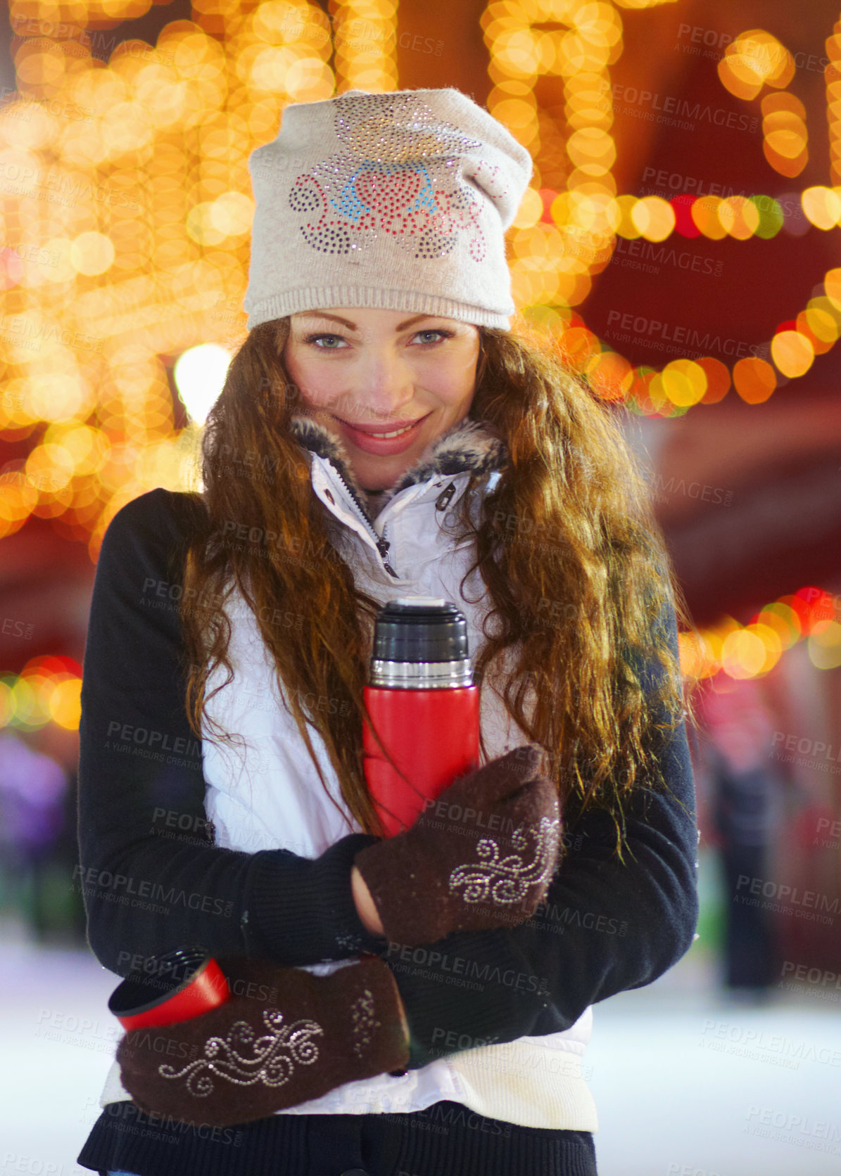 Buy stock photo Woman, ice skating and outdoor portrait with coffee in night winter holiday, training or exercise. Girl, vacation and happiness for sport, skate or fitness with excited face for drink, matcha or coco