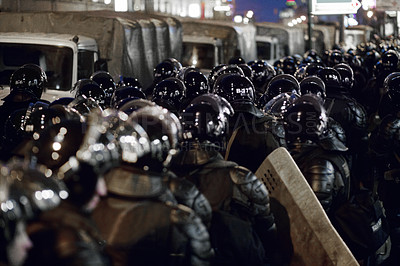 Buy stock photo The army barricading a riot in the city