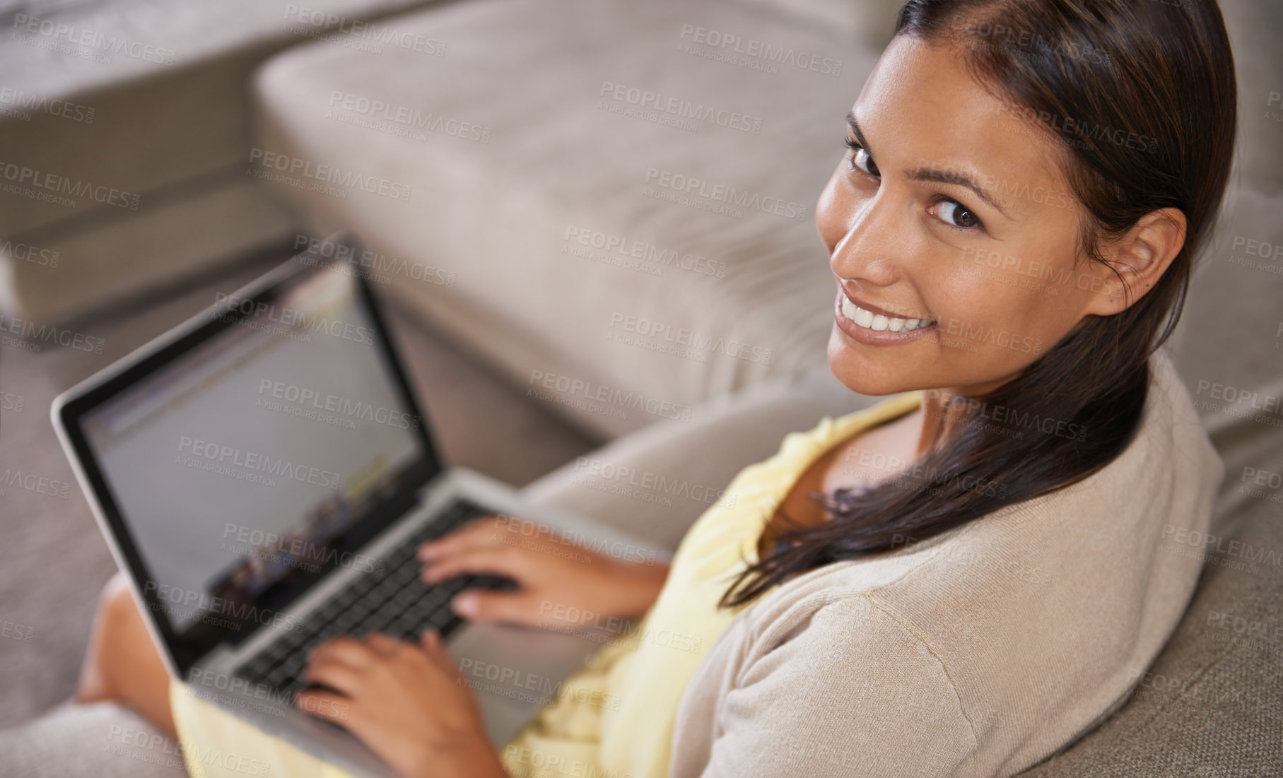 Buy stock photo Woman, laptop and work from home on sofa with research, copywriting and planning online. Portrait of a young person, freelancer or writer typing on her computer, website or blog and relax on a couch