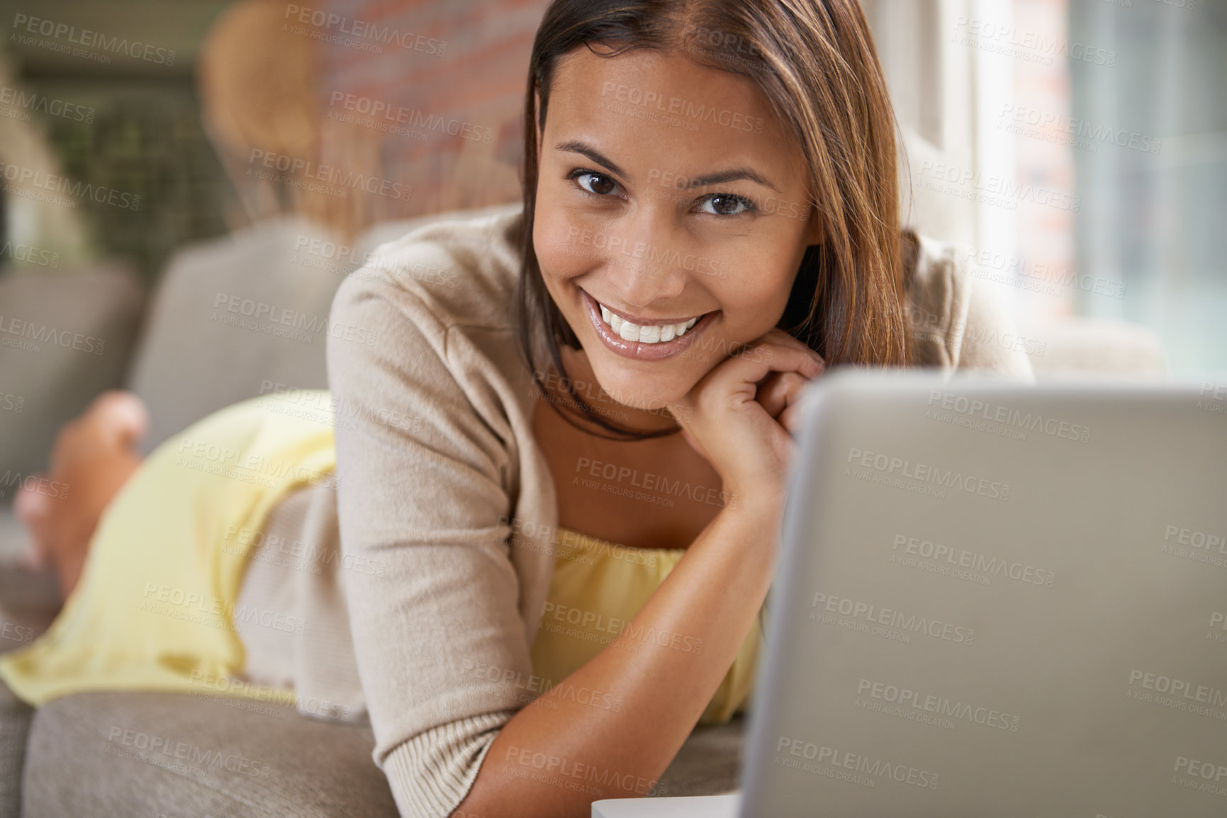 Buy stock photo Portrait, woman or laptop on sofa to search, internet or website for social media browsing. Female person, smile or computer on couch for checking email, reading blog or online surfing in living room