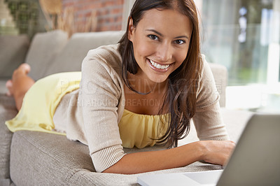 Buy stock photo Woman, computer and relax on sofa with online planning, education and research for remote e learning. Portrait of happy person or student on a couch, home or living room with laptop for subscription
