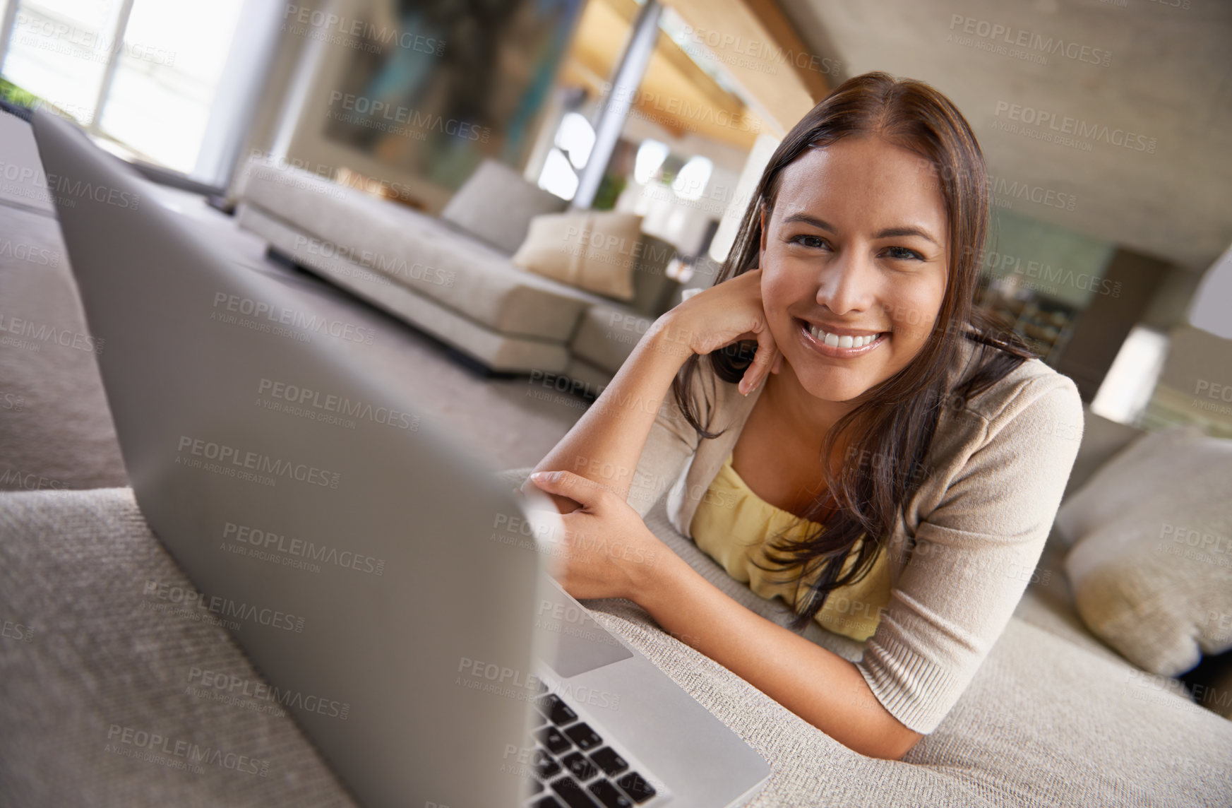 Buy stock photo Portrait, woman or laptop on sofa on internet, social media or digital communication in living room. Female person, smile and computer on couch to relax, search and web video streaming at weekend