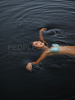 Buy stock photo Happy, woman and relax in lake for swimming, fresh water and wellness adventure with freedom. Female person, smile and river with vacation in summer for holiday, travel and getaway in nature