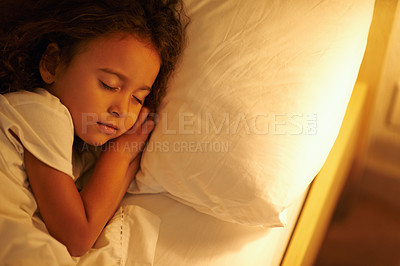 Buy stock photo Child, sleeping and peace in bed at night, comfortable and tired or dream on pillow in home. Female person, girl and resting in bedroom or lying to relax, exhausted and fatigue or blanket for calm