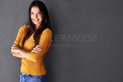 Buy stock photo Portrait, arms crossed and woman in studio, fashion or cool style in gray background. Female person, smile and happy with confidence in mockup space, stylish and edgy in casual outfit or clothes