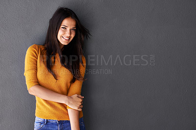 Buy stock photo Portrait, female model and sweater in studio, fashion or cool style in gray background. Woman, smile and happy with confidence or pride in mockup space, stylish and edgy in casual outfit or clothes