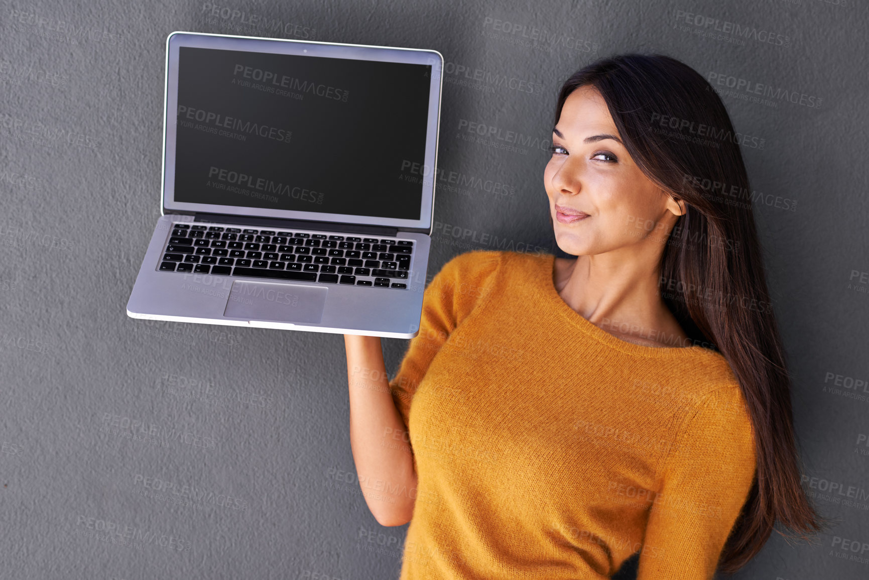 Buy stock photo Woman, portrait and laptop screen in studio, blank and mockup space for website or app. Female person, promotion and empty display for marketing or advertising, social media and gray background