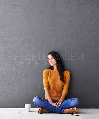 Buy stock photo Woman, thinking and relax or calm in home, peace and cup of coffee on floor of living room. Female person, mockup space and wall background for contemplating, drink and daydreaming in apartment