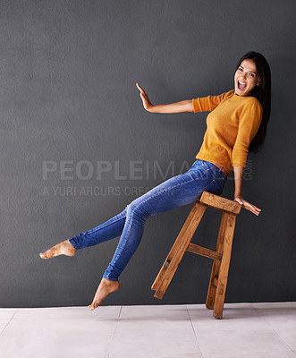 Buy stock photo Woman, stool and fashion for style, trendy and portrait for smile and apparel in clothes and excited. Female person, silly and lean on chair for wardrobe, confident and elegant funny and mockup