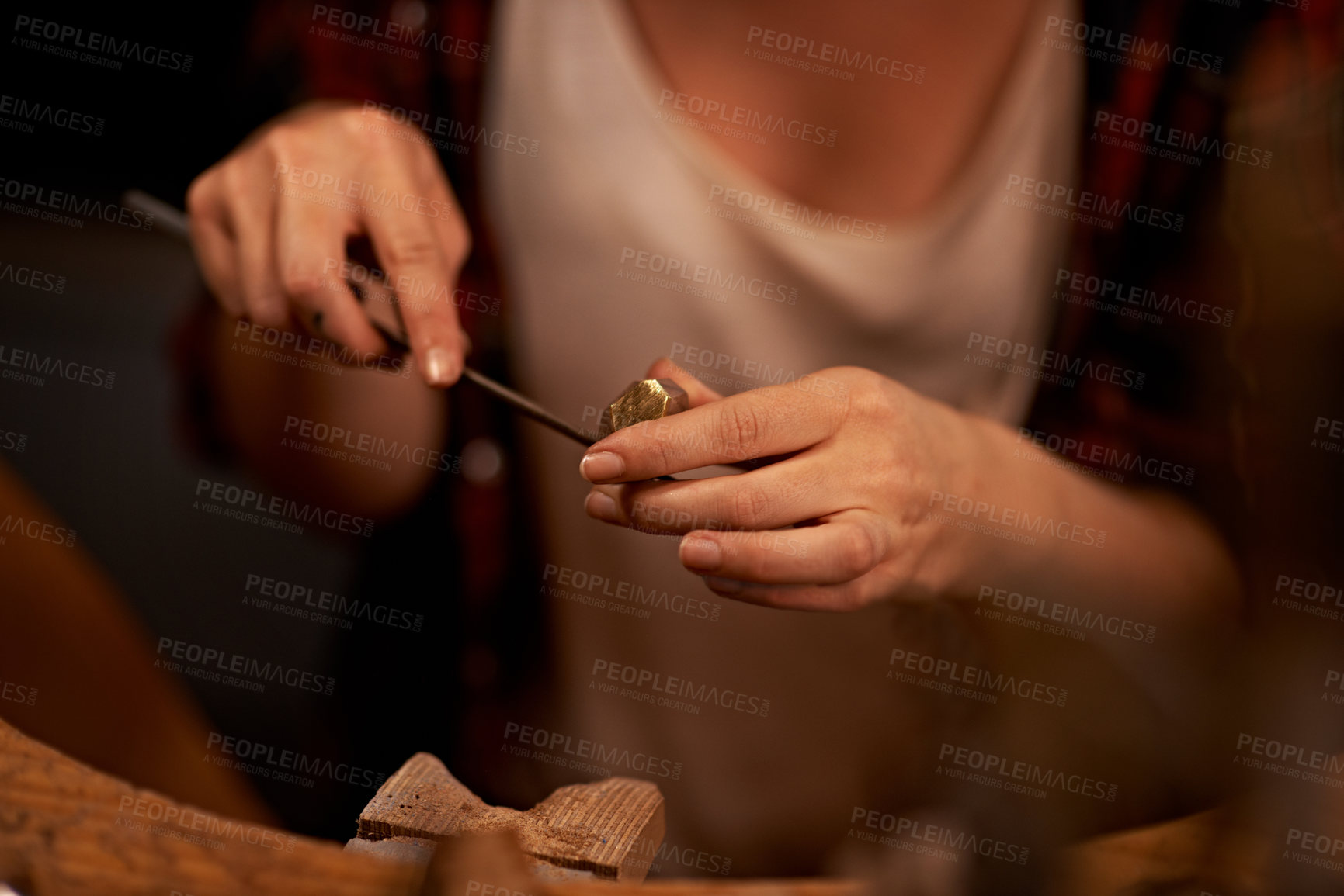 Buy stock photo An artist creating something out of wood