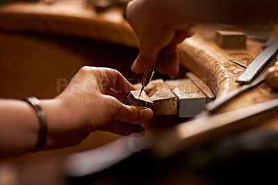 Buy stock photo A person using a tool to work on a piece of wood