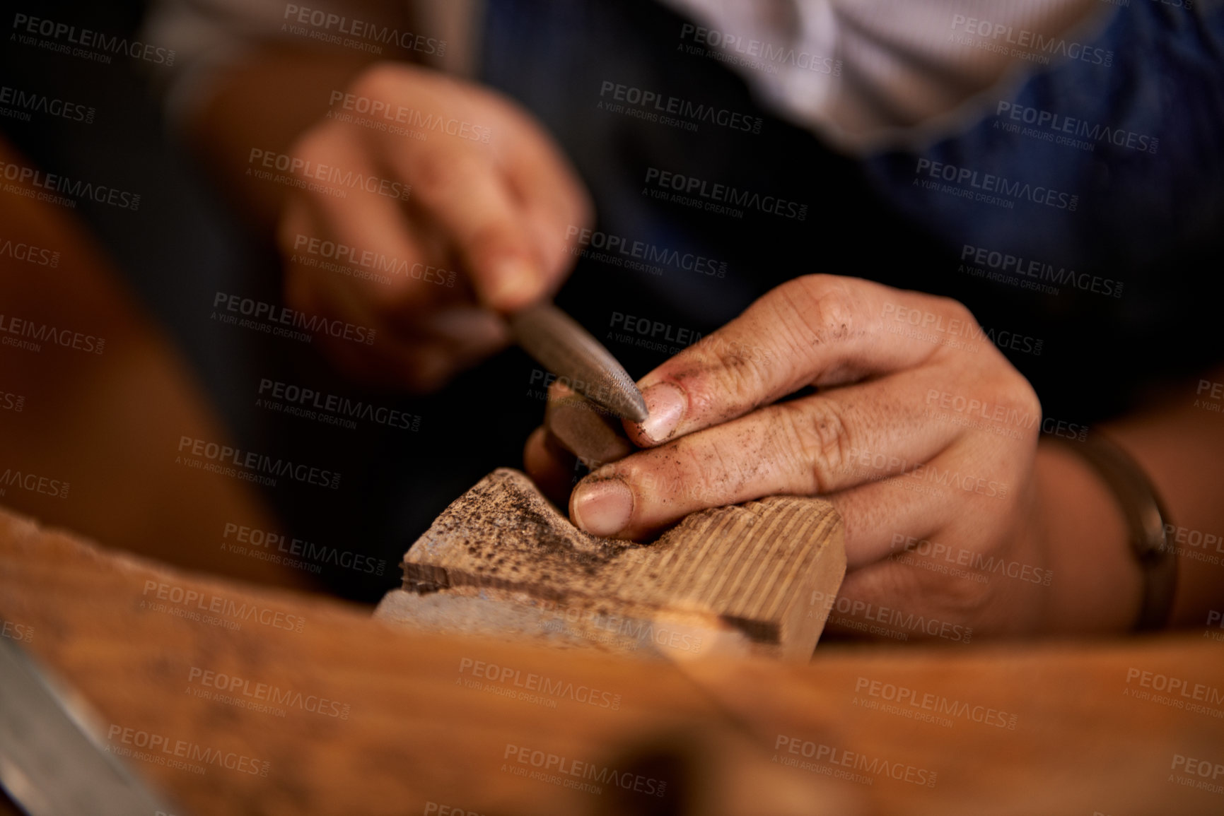 Buy stock photo Carving, wood and hands of artist with tools in workshop for creative project or process of sculpture on table. Artisan, carpenter and person closeup with talent in studio for unique woodworking