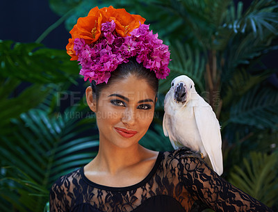 Buy stock photo Jungle, portrait or woman with flowers or parrot, natural cosmetics for wellness in nature aesthetic. Smile, animal or female Indian model in rainforest for skincare beauty, pet bird or floral art