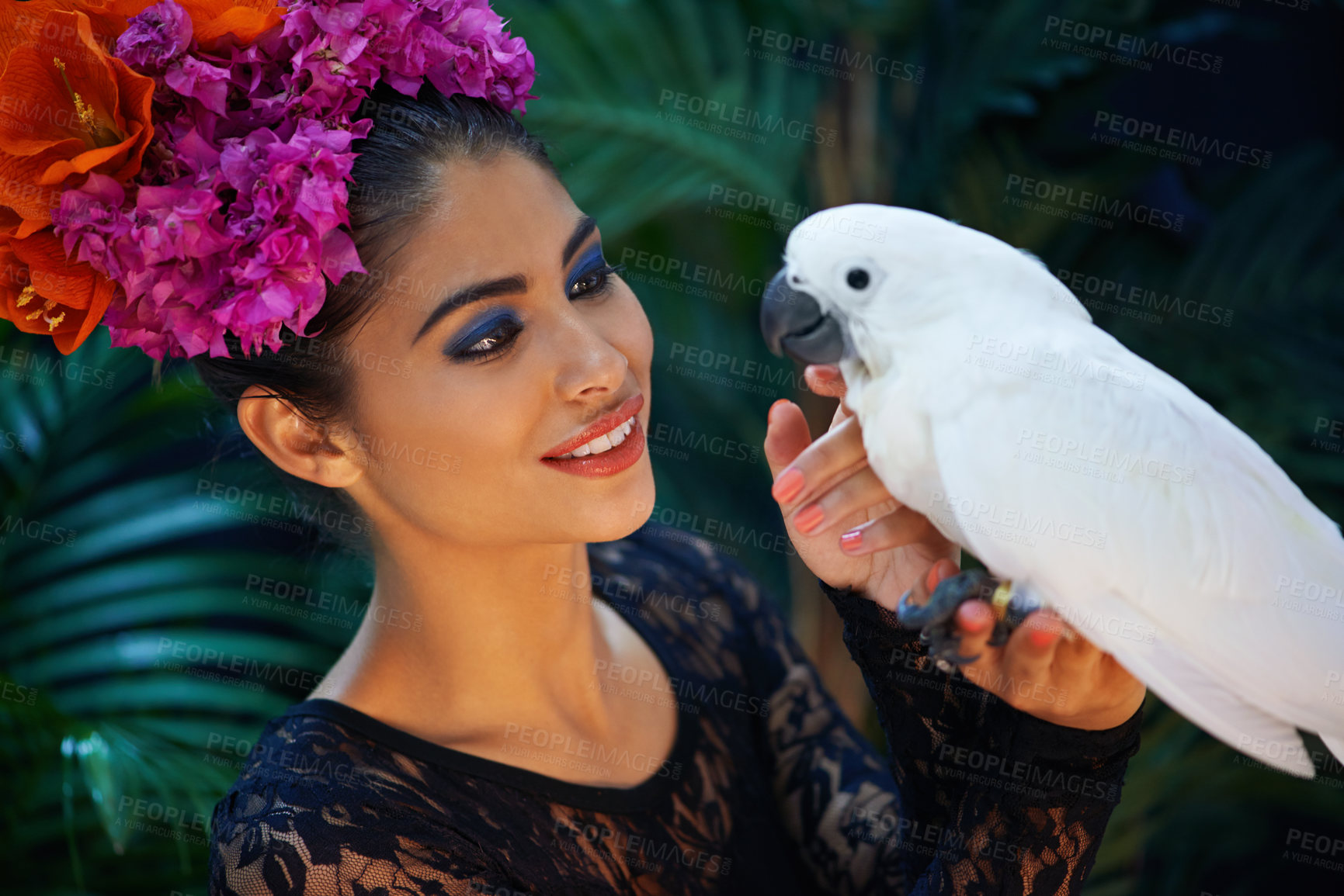 Buy stock photo Jungle, bird or woman with flowers or parrot, natural cosmetics for wellness in nature aesthetic. Smile, face or happy female Indian model in rainforest for skincare beauty, pet animal or floral art