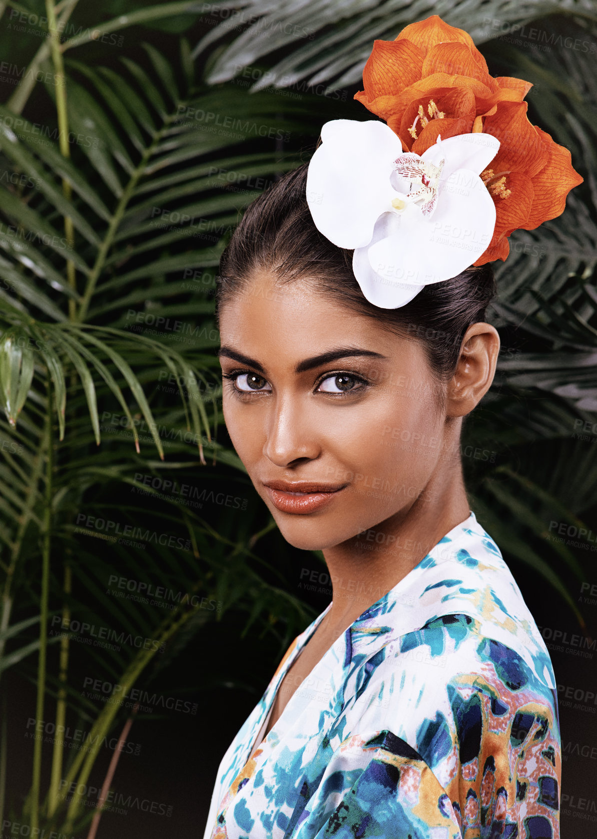 Buy stock photo A portrait of a beautiful woman wearing a floral headdress in a jungle