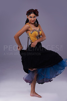 Buy stock photo Dancer, studio or woman in dress dancing with energy, freedom or fashion in portrait for style. Spanish, purple background or artist in flamenco, tango or performance in musical culture or tradition