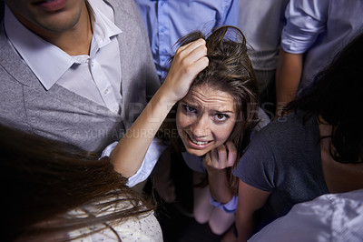 Buy stock photo Woman, people and social anxiety in stress with fear, worried and panic with nervous, thinking and phobia. From above, female person and scared as introvert in conference with group and insecure