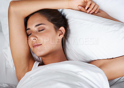 Buy stock photo Pillow, relax and woman sleeping on bed, bedroom and peace on mattress, soft and comfortable. Home, tired and female person rest for fatigue, health and break for weekend in house with cozy duvet