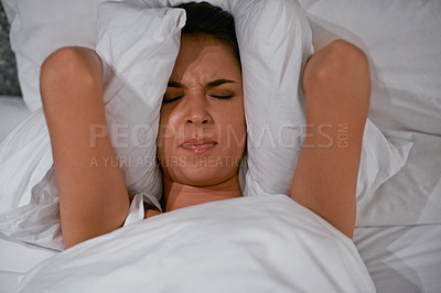 Buy stock photo Restless, bed and woman frustrated with insomnia, annoyed and unable to sleep with stress at night. Sick, female person and girl unhappy with mental health, fatigue and hands on pillow to cover ears