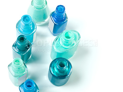 Buy stock photo Nail polish, blue color and bottle on a white background for beauty, cosmetics and salon products. Cosmetology, luxury spa and isolated jar for manicure, pedicure and pamper aesthetic in studio