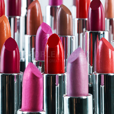 Buy stock photo A studio shot of different coloured lipsticks