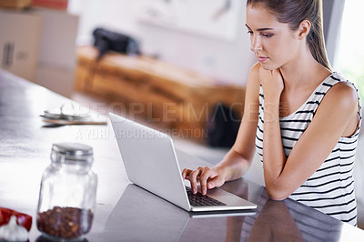 Buy stock photo Reading, blog and woman in kitchen with laptop for research for remote work as a writer. Online, article and person scroll on computer and learning from internet about information for writing
