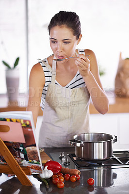 Buy stock photo Young woman cooking at home
